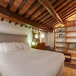 Orange Room With Bathroom And Shared Terrace