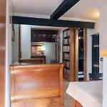 Orange Room With Bathroom And Shared Terrace