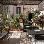 Orange Room With Bathroom And Shared Terrace