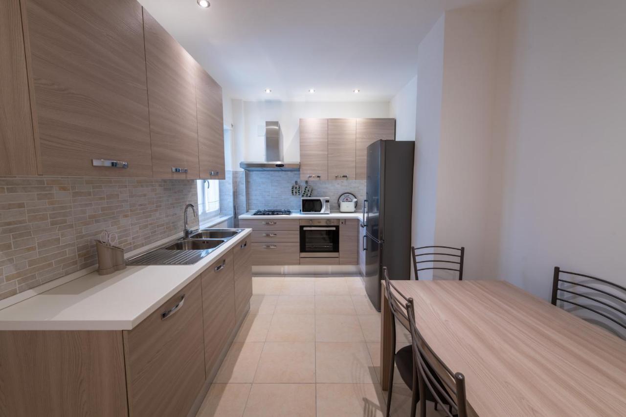 Casa Rosa Beige E Blu Apartment