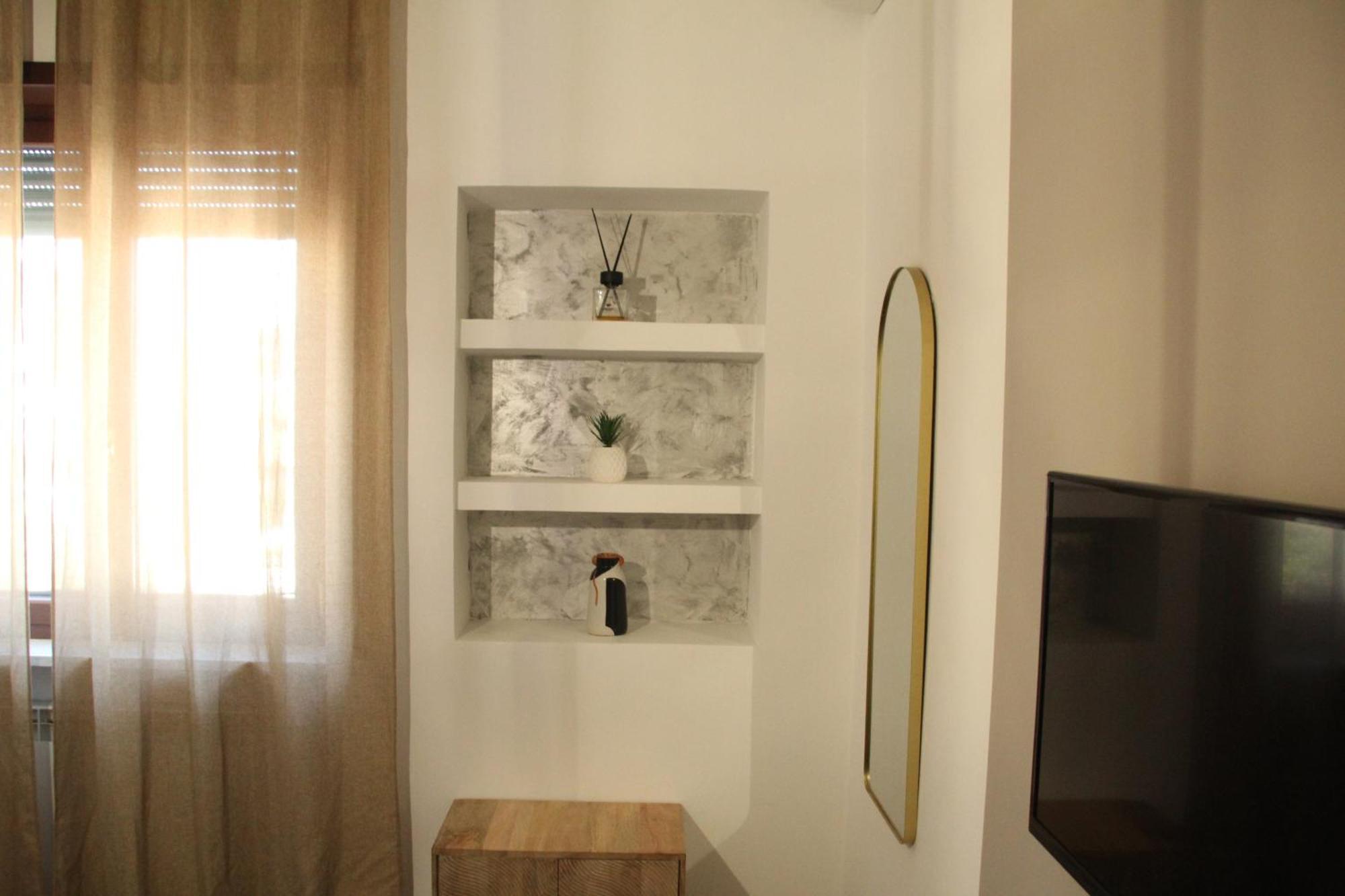 Capital House Apartment Rom