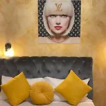 Romoli Rooms And Suites