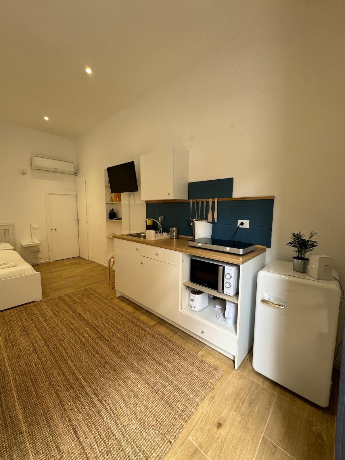 Cozy Loft San Giovanni Feriehus *