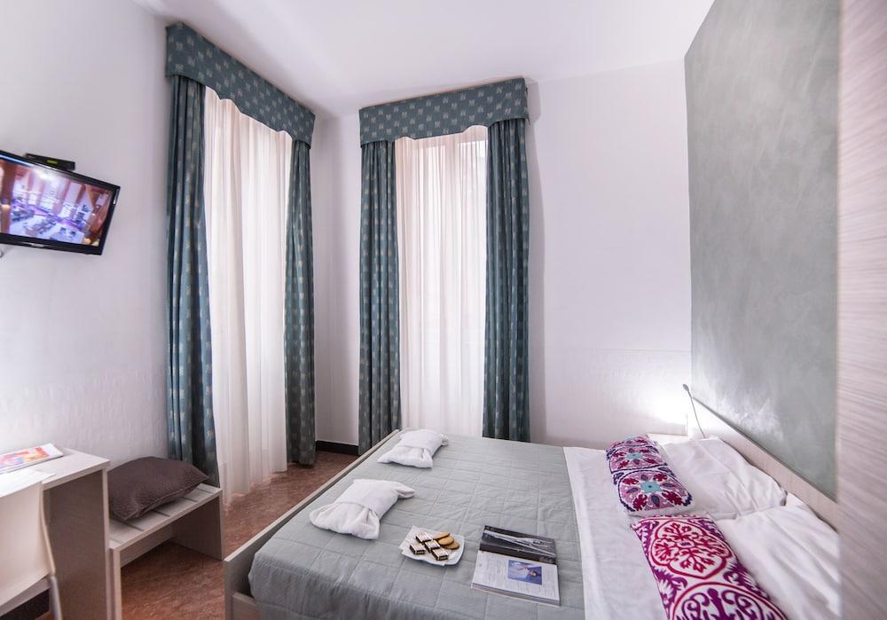 Hotel Dharma Boutique & Rom
